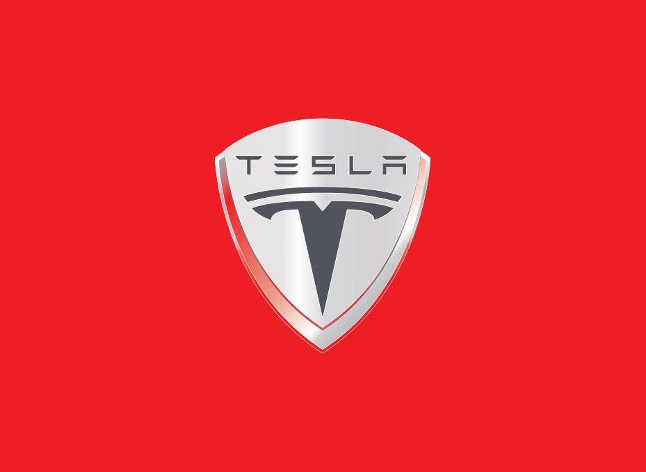 Car with T in Shield Logo - The Tesla Motors logo is a cross section of an electric motor