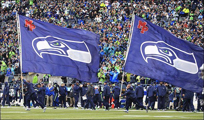 Marysville MP Logo - Raiders Seahawks Football Seattle Seahawks flags, including an 