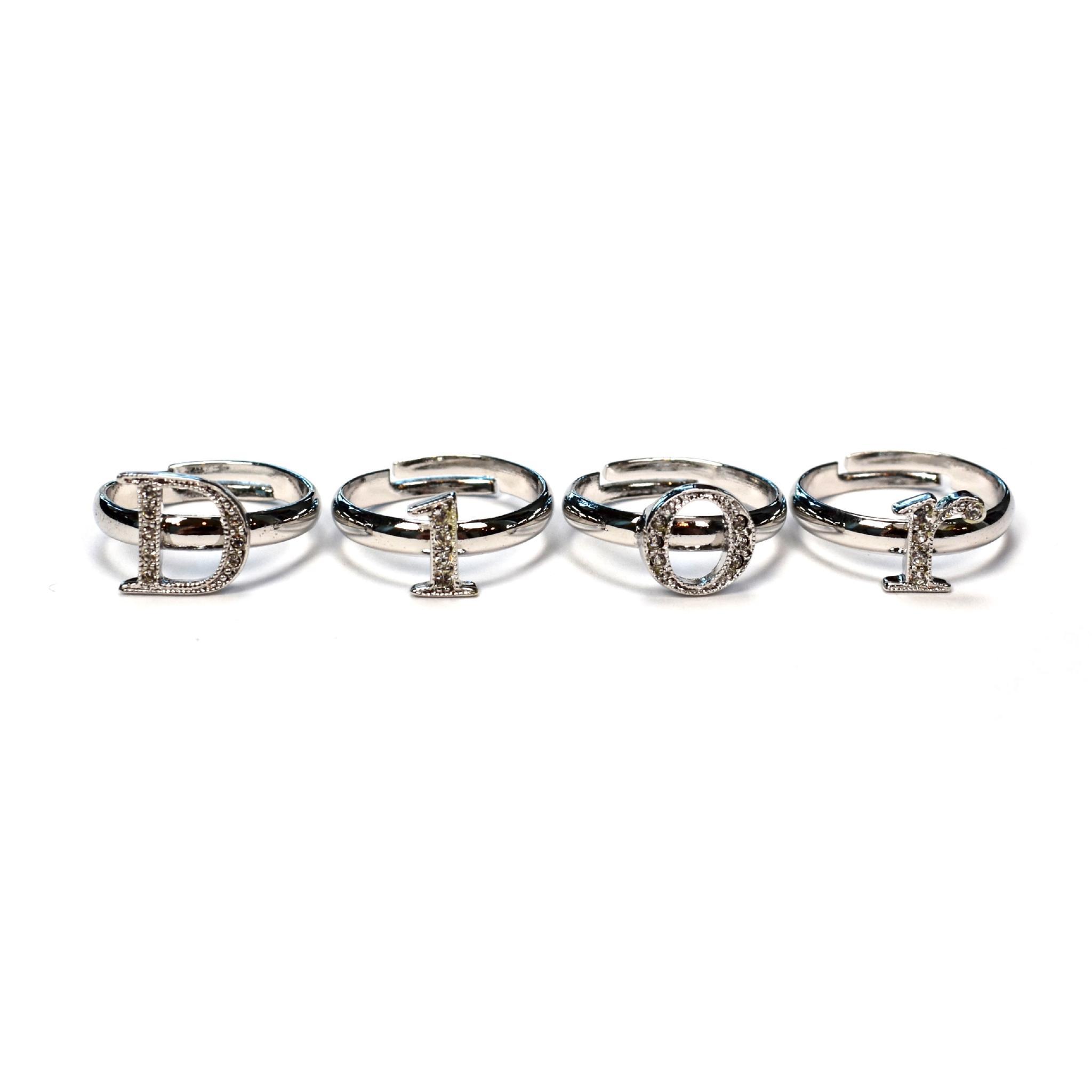 4 Rings Logo - Christian Dior Boutique of 4 Crystal Inset Spell Out Logo