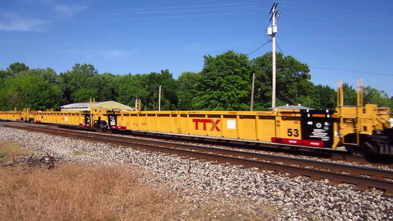 TTX Rail Logo - CN 8015 and CN 2711 moving new TTX well cars and CAI covered hoppers