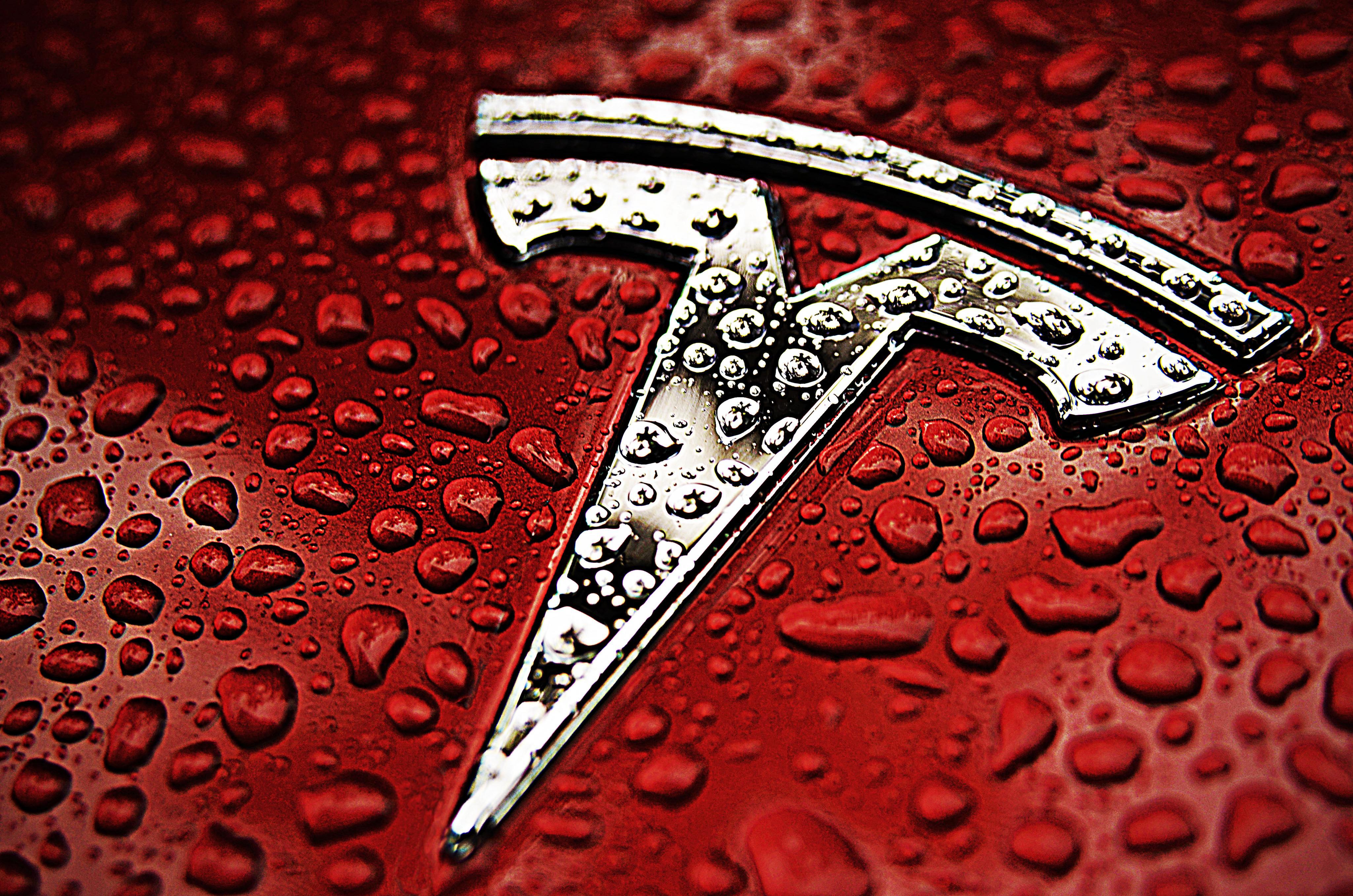 Tesla Vehicle Logo - Red-Tesla-Emblem-Logo-Water - TESLARATI.com