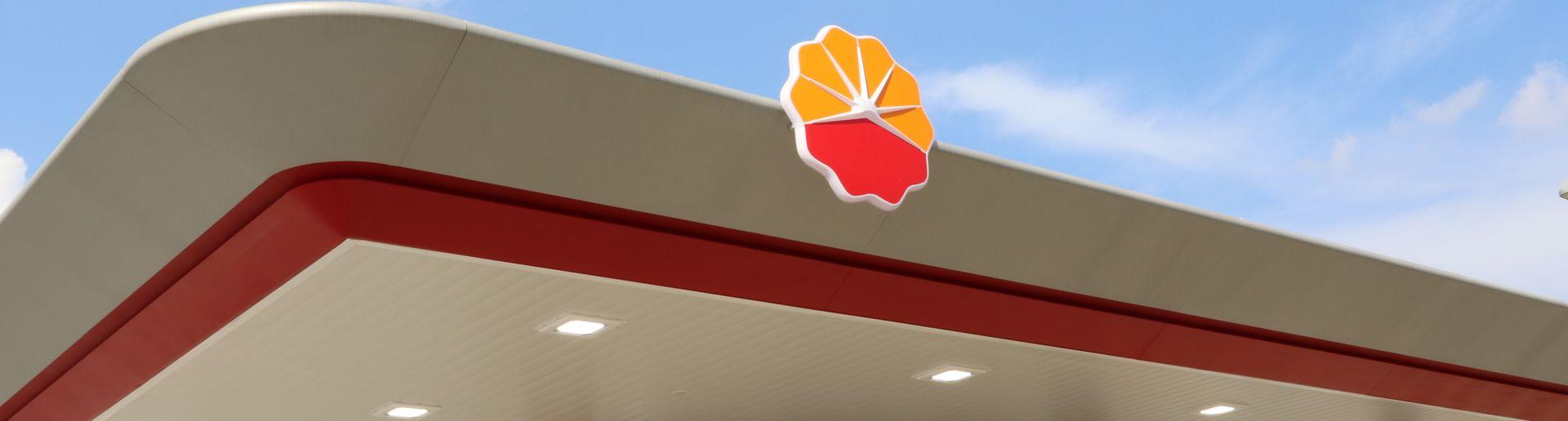 Orange and Red Banner Logo - New Station Design - SPC: Singapore Petroleum Company