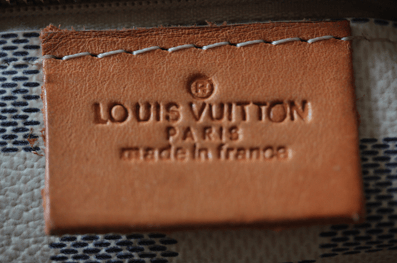 Authentic Louis Vuitton Logo - Fake Louis Vuitton Bags: How to Spot a Real One