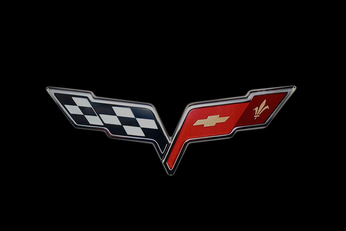 First Corvette Logo - Evolution Of The Corvette And The Crossed Flags Logo | Top Speed
