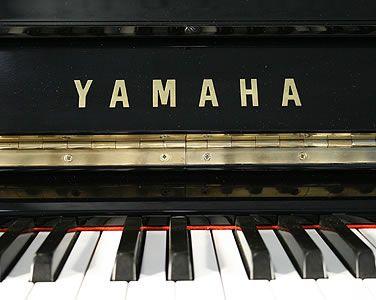 Yamaha Piano Logo - Yamaha YUX Upright piano with a black case and polyester