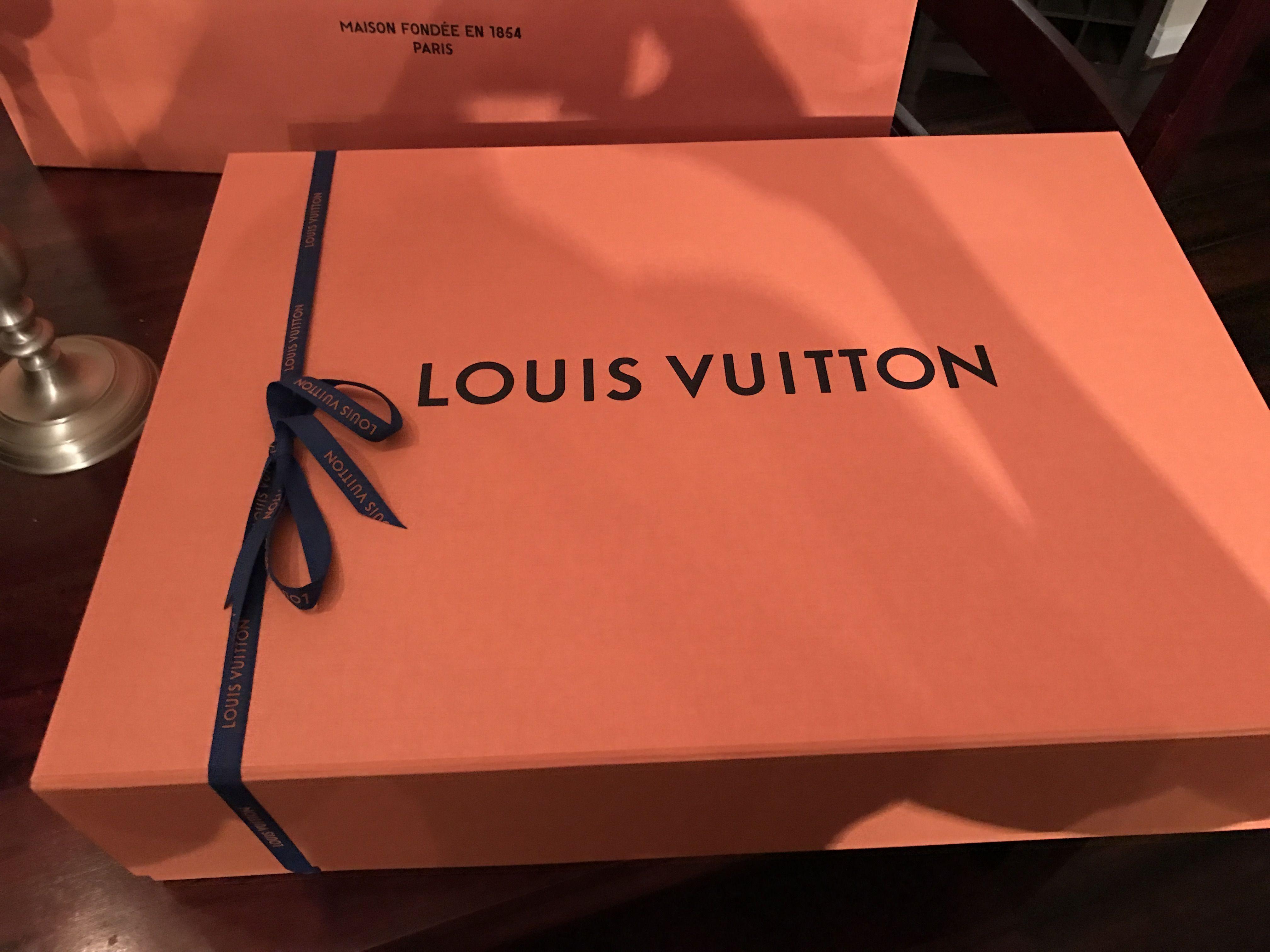 Orange Louis Vuitton Logo - Louis Vuitton's Orange Boxes and Bags