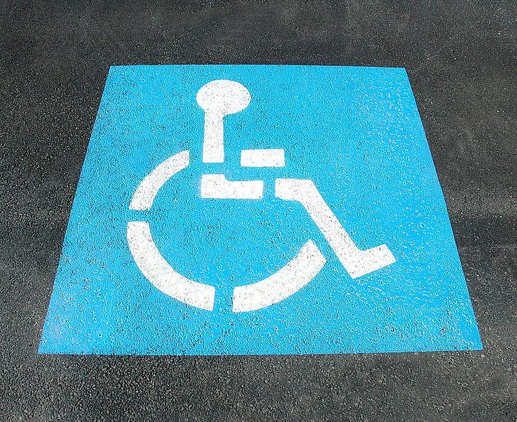 Grey and Blue Handicap Logo - Royalty Free Photo: Disability Logo