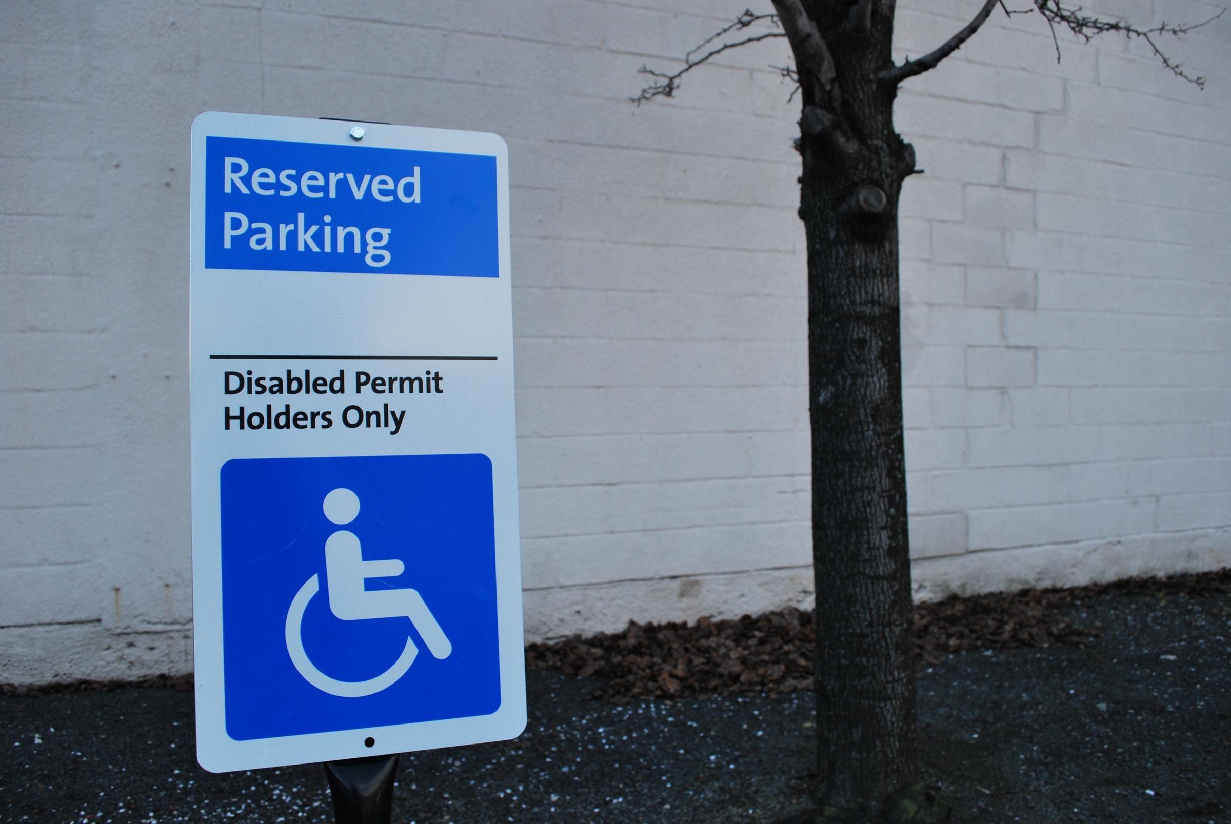 Grey and Blue Handicap Logo - New Law Cracks Down on Handicapped Parking Cheaters | Iowa Public Radio