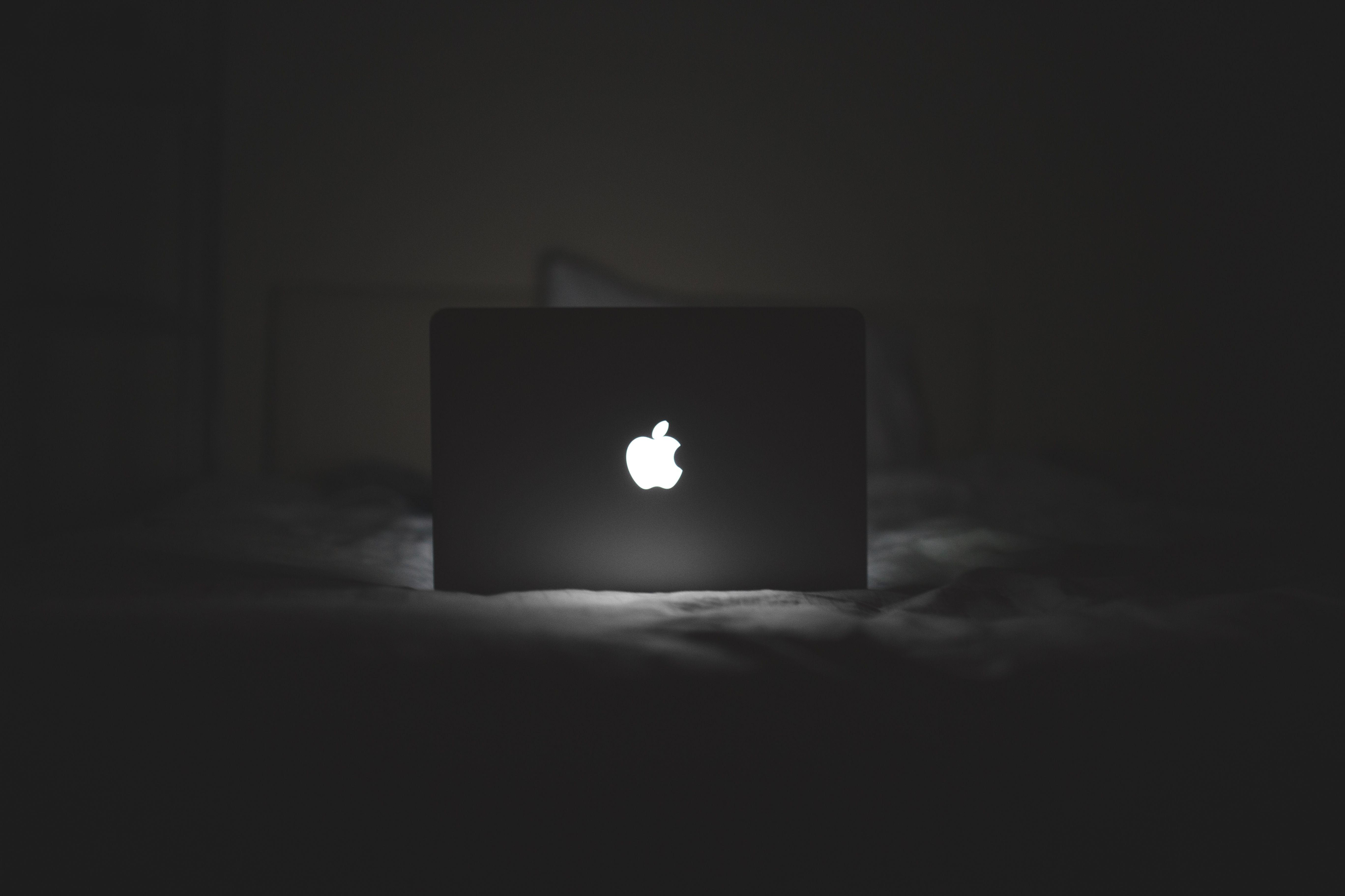 All Black Apple Logo - B&W MacBook Glowing Apple Logo Free Stock Photo - NegativeSpace