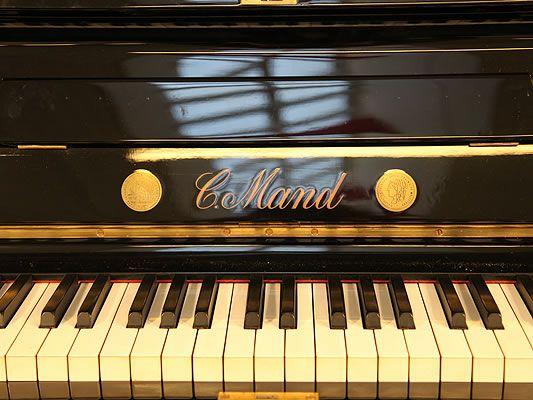 Gold Piano Logo - C. Mand Upright piano for sale with an Empire style black case with ...