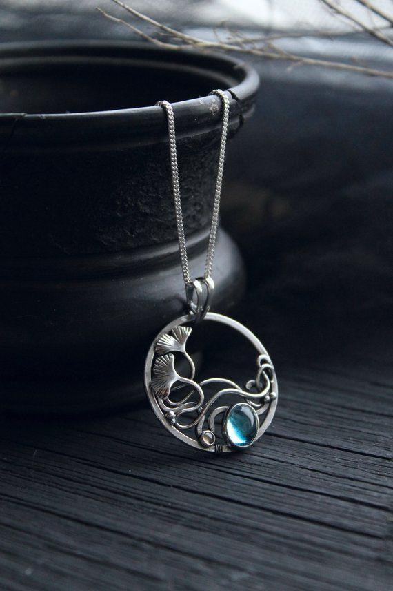 Pretty Silver Circle Logo - Blue Topaz sterling silver circle necklace wrapped pendant