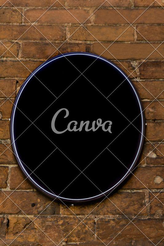 Empty Oval Logo - Empty Oval Sign on the Old Brick Wall - Photos by Canva