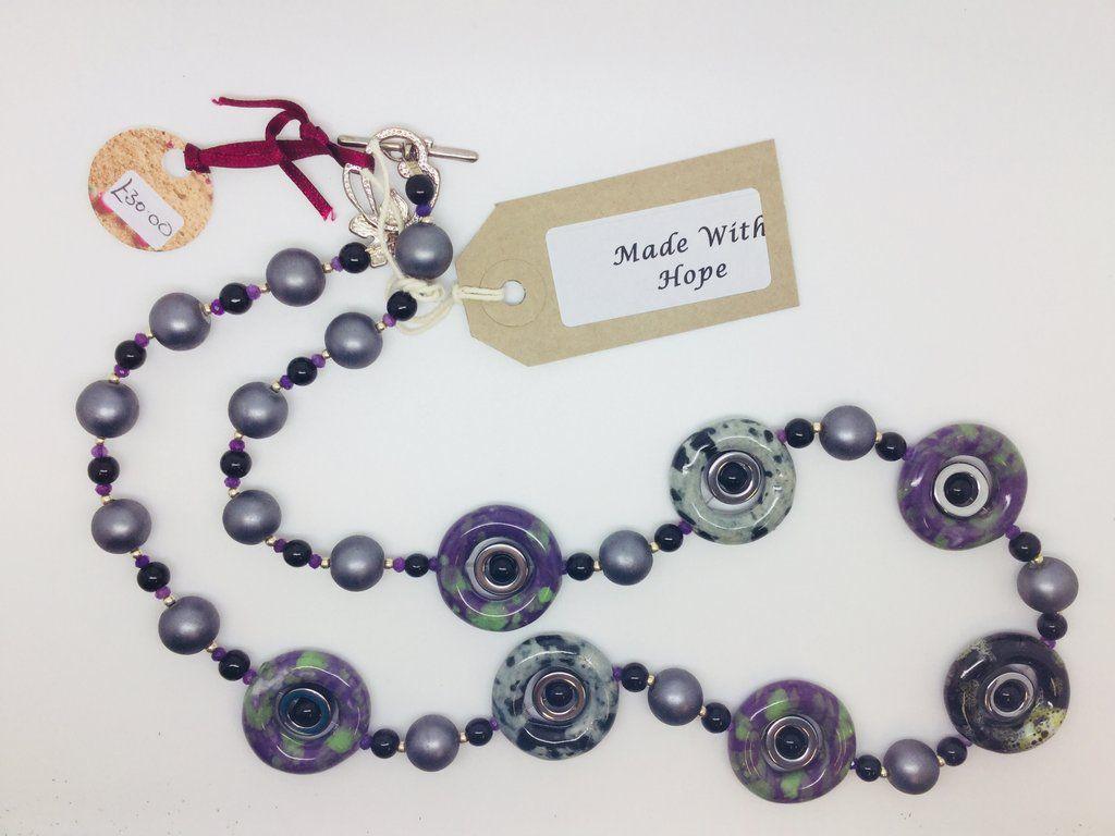 Grey and Purple Circle Logo - Grey, Purple & Green circle bead necklace. The Autism Trust UK