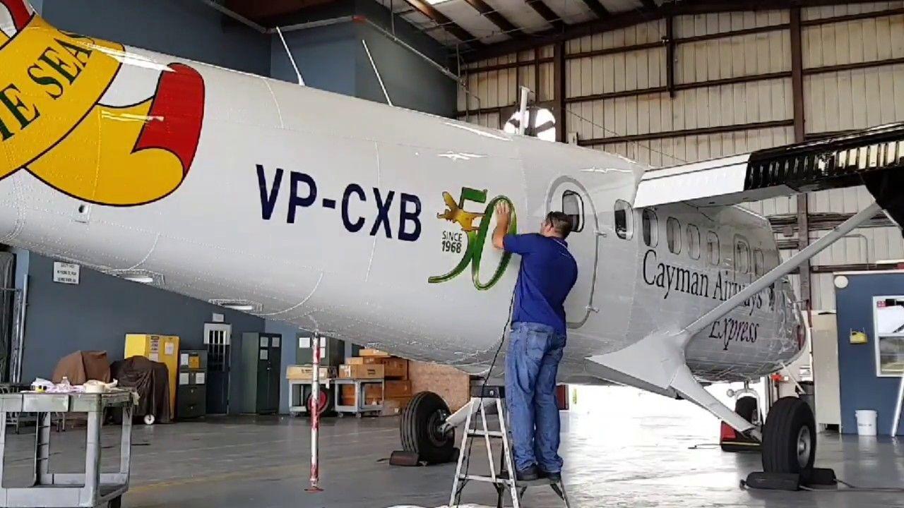 Aircraft Anniversary Logo - Cayman Airways' commemorative 50th anniversary logo is applied to a ...