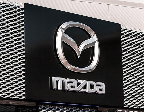 Black Mazda Logo - Barnetts claims a first with new Mazda showroom style | Car Dealer News