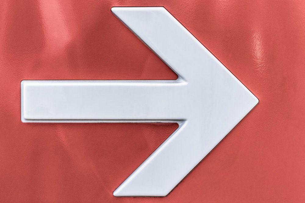 Red White Arrow Logo - In the right direction photo by Paweł Czerwiński (@pawel_czerwinski ...