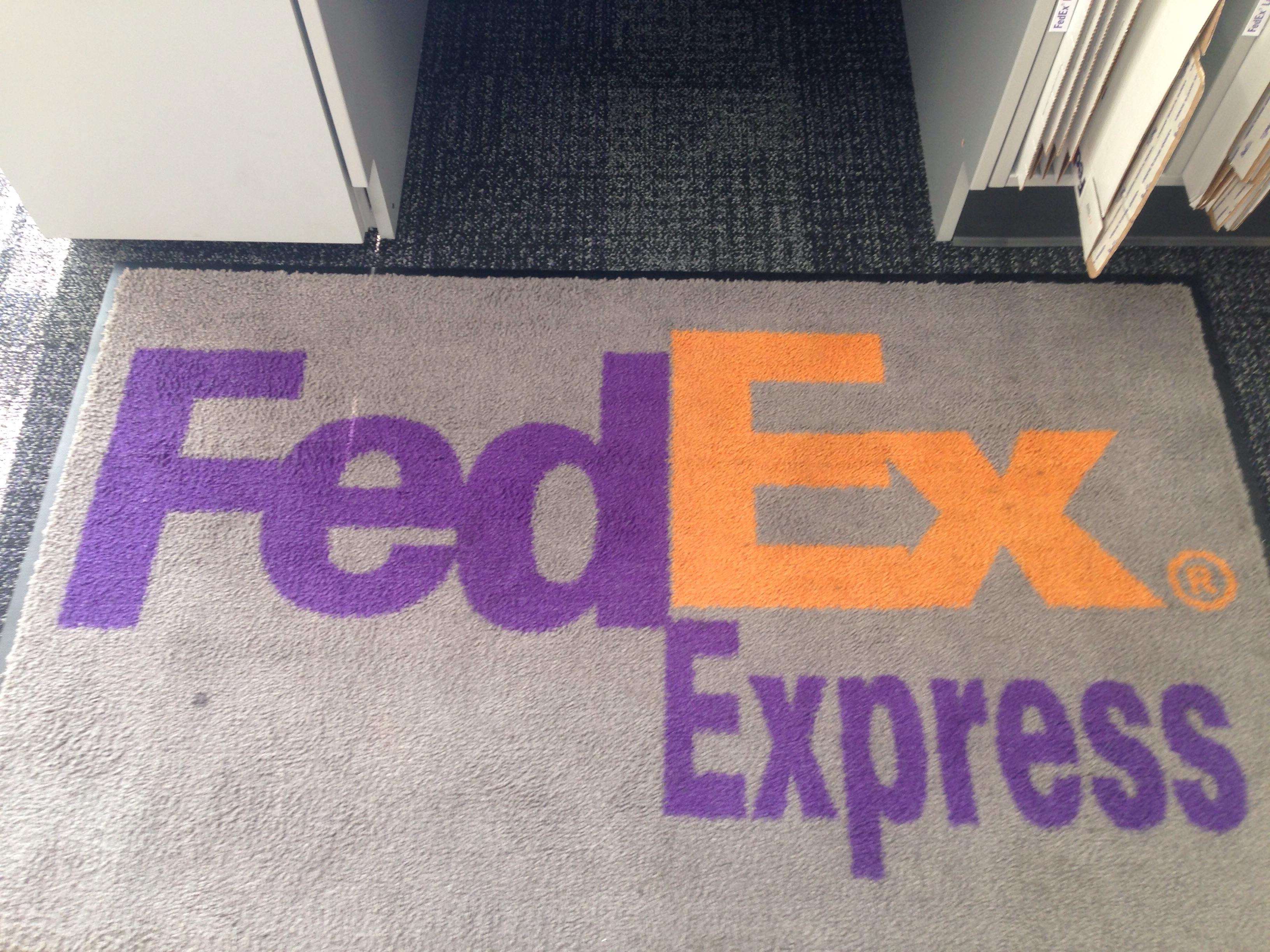 FedEx Official Logo - The Ex Part of this FedEx rug doesn't make the arrow like