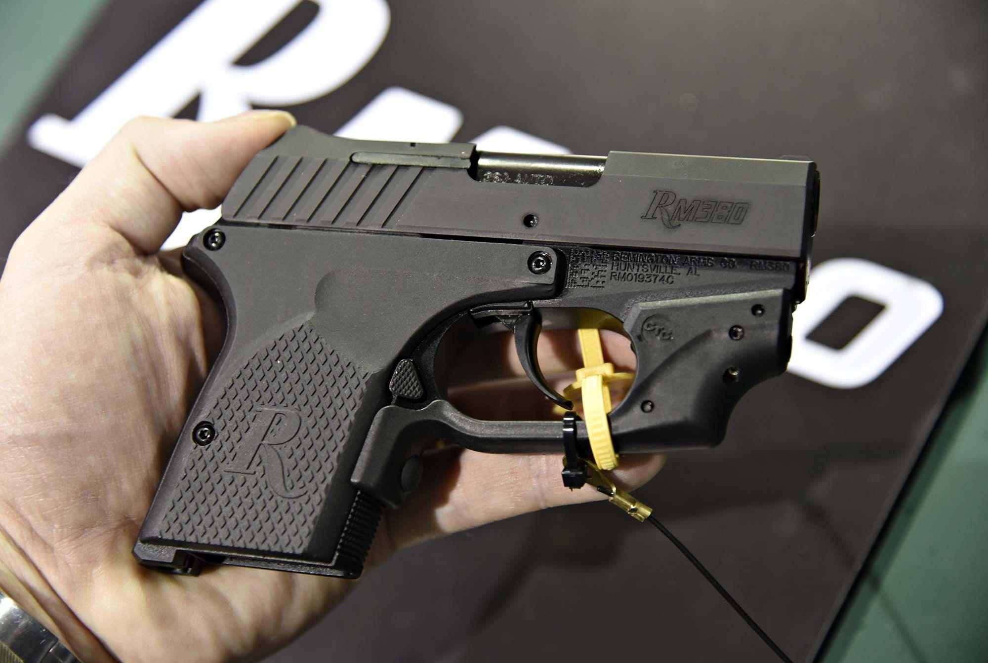 Green and Black Guns Logo - Remington RM380 pocket pistol: little black gun from the big green ...