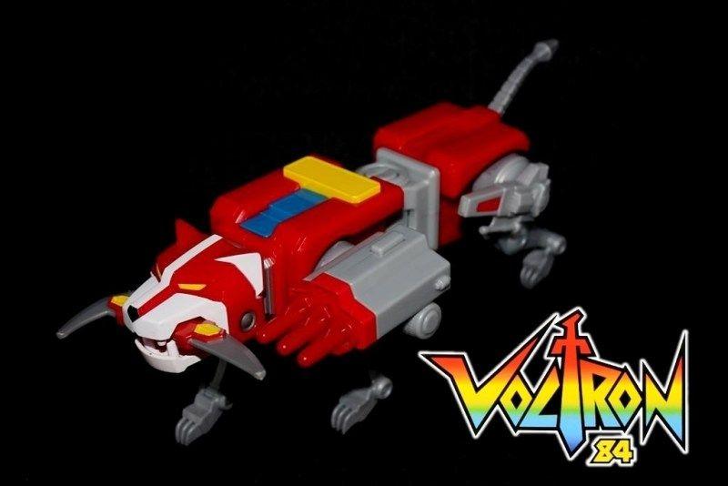 Red and Blue Lion Logo - Classic 84 Voltron Red Lion Review - Needless Essentials Online