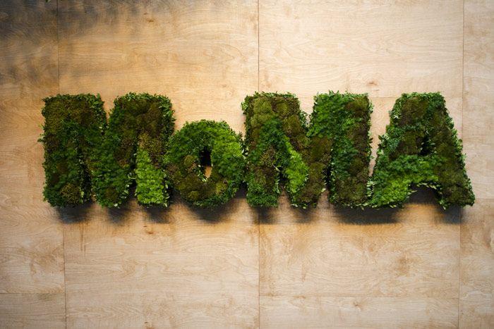 Moss Logo - The arrivals backdrop featured a moss- and greenery-covered museum ...