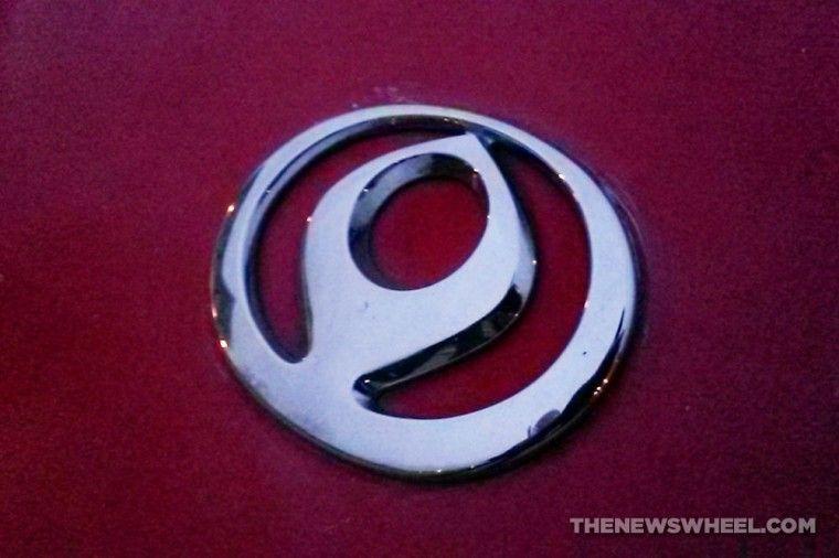 Mazda Logo - Behind the Badge: The Fascinating History of the Mazda Logo