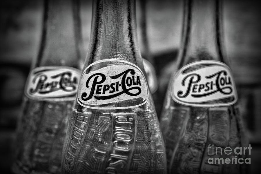 Vintage Pepsi Bottle Logo - Two Vintage Pepsi Bottles In Black And White Photograph by Paul Ward