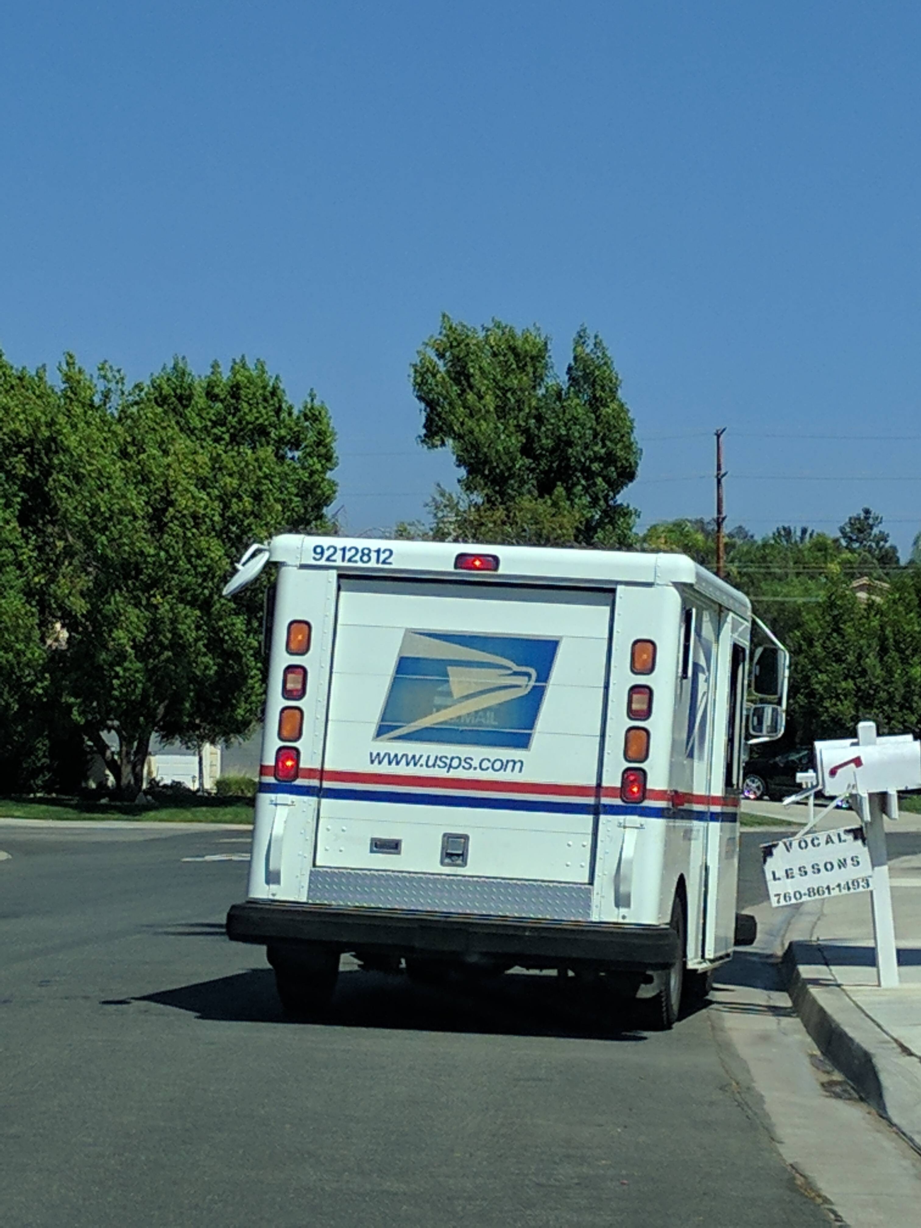 Old USPS Logo - This USPS truck is so old that you can see the old logo through the ...