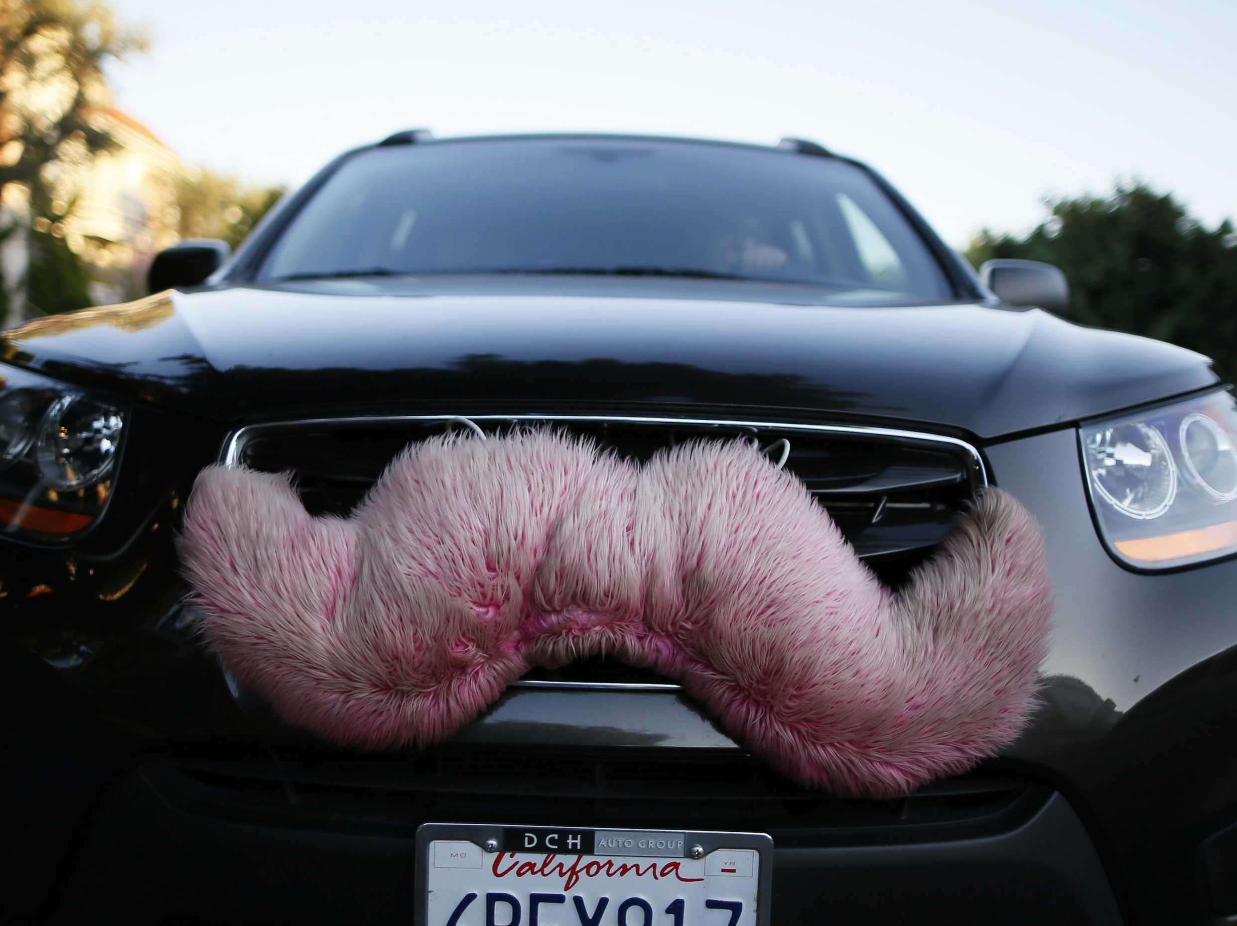 Pink Mustache Lyft Logo - Lyft Is Getting Rid Of Its Trademark Pink Mustache For A Less-Cuddly ...