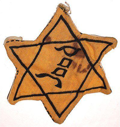 Brown and Yellow Star Logo - The National Holocaust Centre and Museum. Yellow Star; 'Jood'