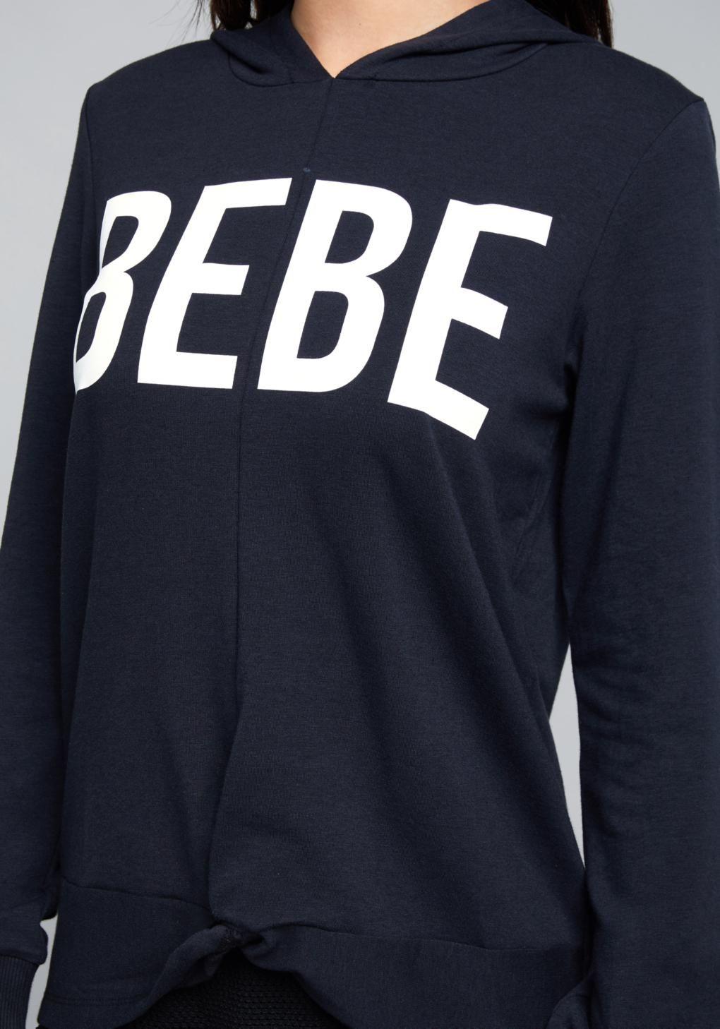 Bebe Clothing Logo - Bebe Logo Front Twist Hoodie in Black
