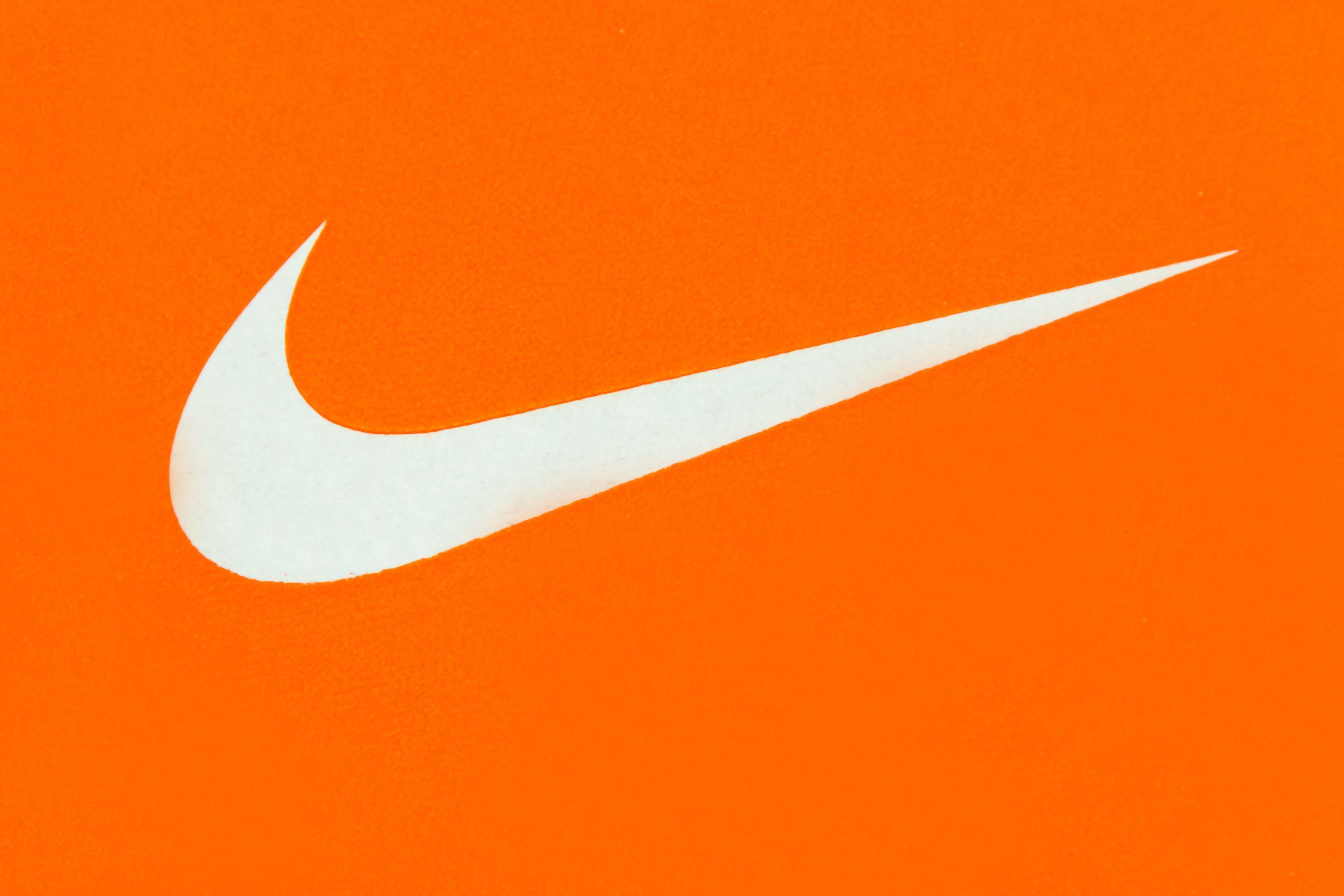 Red Orange White Logo - Basketball: Nike Swoosh to Appear on NBA Uniforms | Time