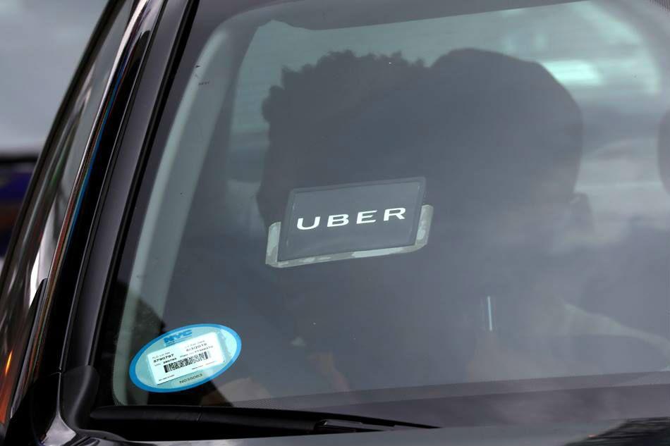Uber Driver Windshield Logo - Uber hits brakes on self-driving trucks | ABS-CBN News