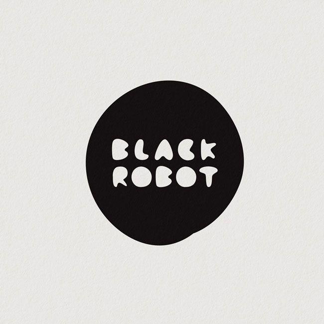 Black and White Robot Logo - Black Robot