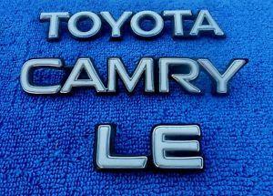 1980s Toyota Logo - 1980'S TOYOTA CAMRY & LE TRUNK EMBLEMS OEM (3 PIECES)