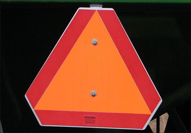 Red Orange Triangle Logo - SMV emblem. Agricultural Safety and Health Program