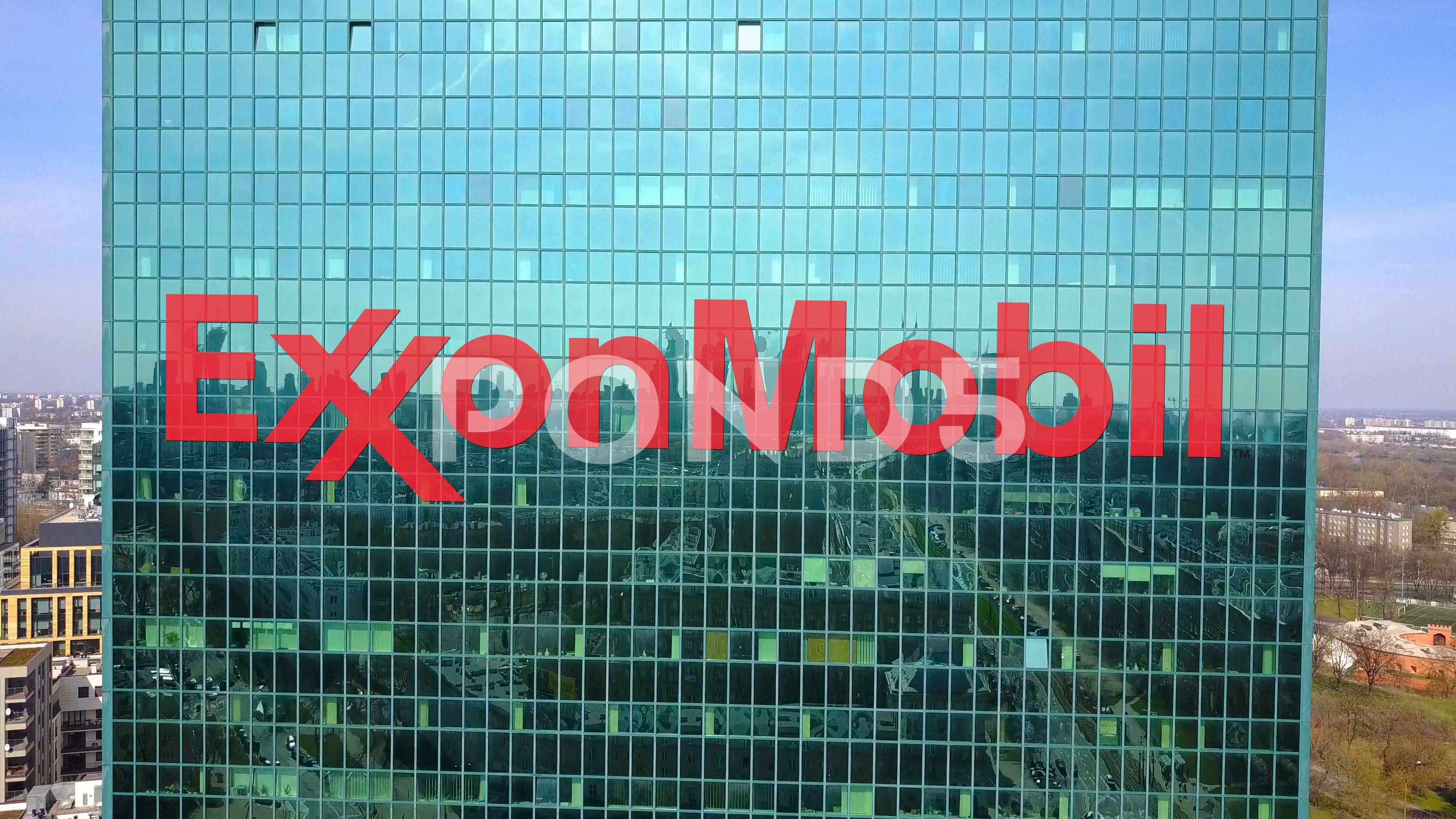ExxonMobil Logo - Aerial shot of office skyscraper with ExxonMobil logo. Modern office ...