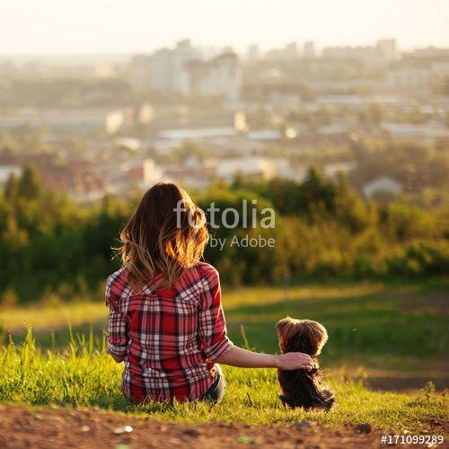 Red People Sitting Back to Back Logo - Young woman back in a red plaid shirt with her pet Yorkshire terrier ...