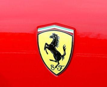 Red Sports Car Logo - Red Sports Car at Ferrari Maranello Italy