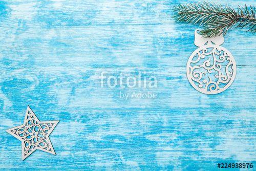 Branches with Blue and Blue Globe Logo - Fir branch, with wooden handmade evergreen toy globe and star, view ...