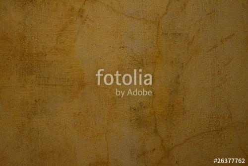 Honey-Colored Logo - Honey colored cracked plaster wall