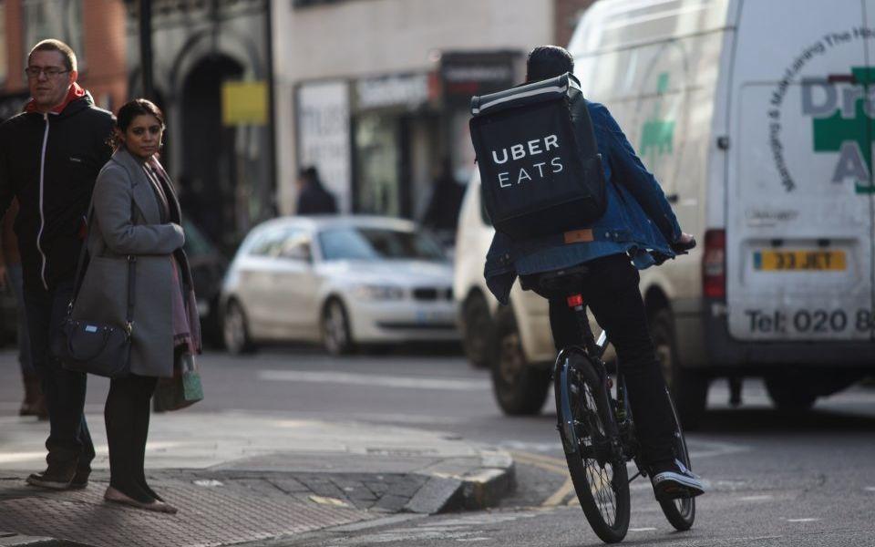 Uber Eats Driver Logo - Uber Eats strike: Drivers protest over pay, blocking east London ...
