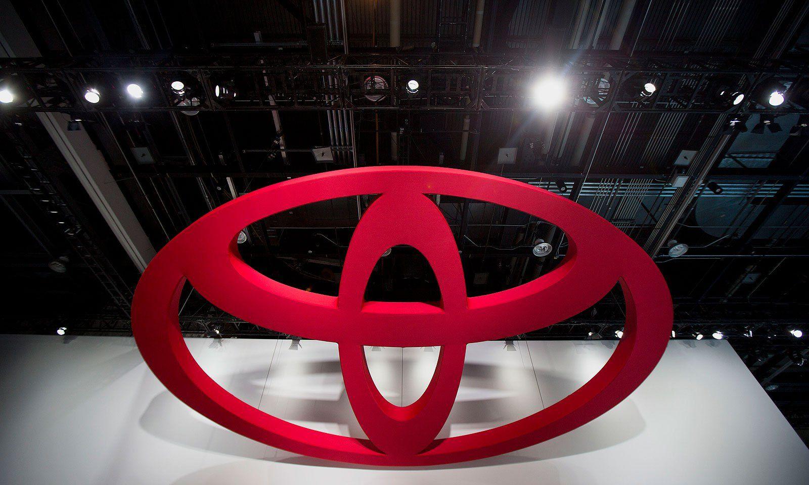Car with Red Oval Logo - Toyota plans to roll into China's EV market in GAC vehicle