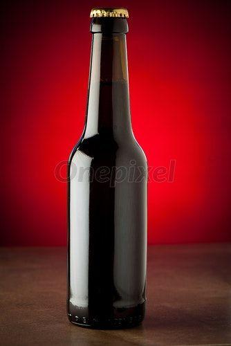 Beer with Red Background Logo - Bottle of beer on a stone table over red background - 3004264 | Onepixel
