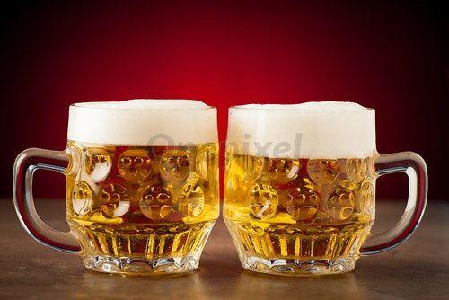 Beer with Red Background Logo - Two glasses of beer on a stone table over red - 3005141 | Onepixel