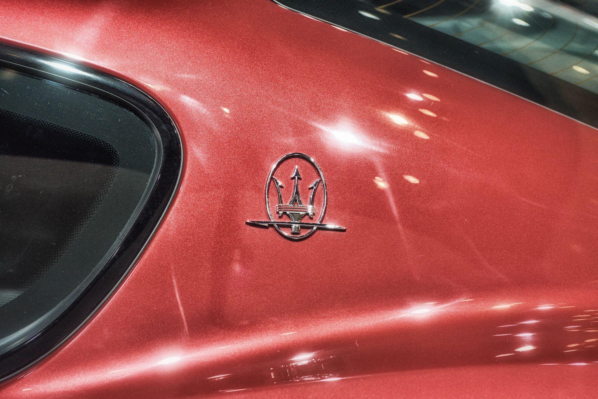 Red Maserati Logo - Maserati Logo On Side of Red Car