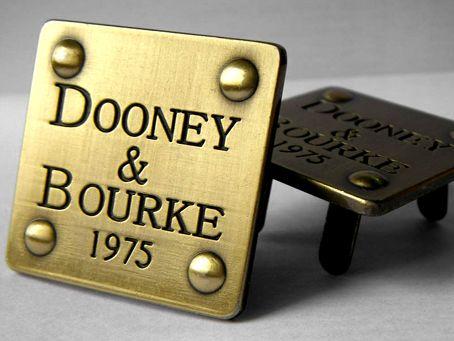 Dooney and Bourke Logo - Background Info about Dooney & Bourke | Handbag Blog - RIONI ®