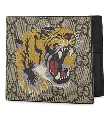 Gucci Lion Logo - GUCCI Supreme canvas and leather wallet