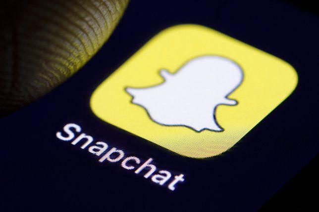 Snapchat App Logo - What do the grey and blue arrows mean on Snapchat? | Metro News