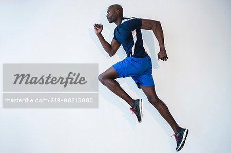 Black Man Running Logo - Side view of Black man running