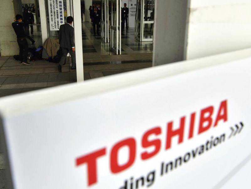 Japanese Electronics Logo - Toshiba, Western Digital make peace on sale of chip unit